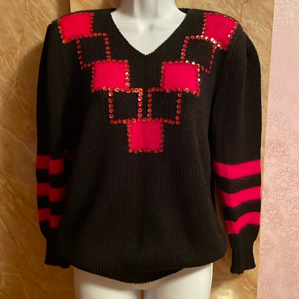 Woman not new sweater black with red and sequins on a front size L